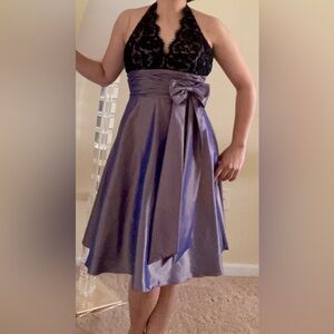 Super Flattering halter dress by JS boutique size 4, black sequin and front bow